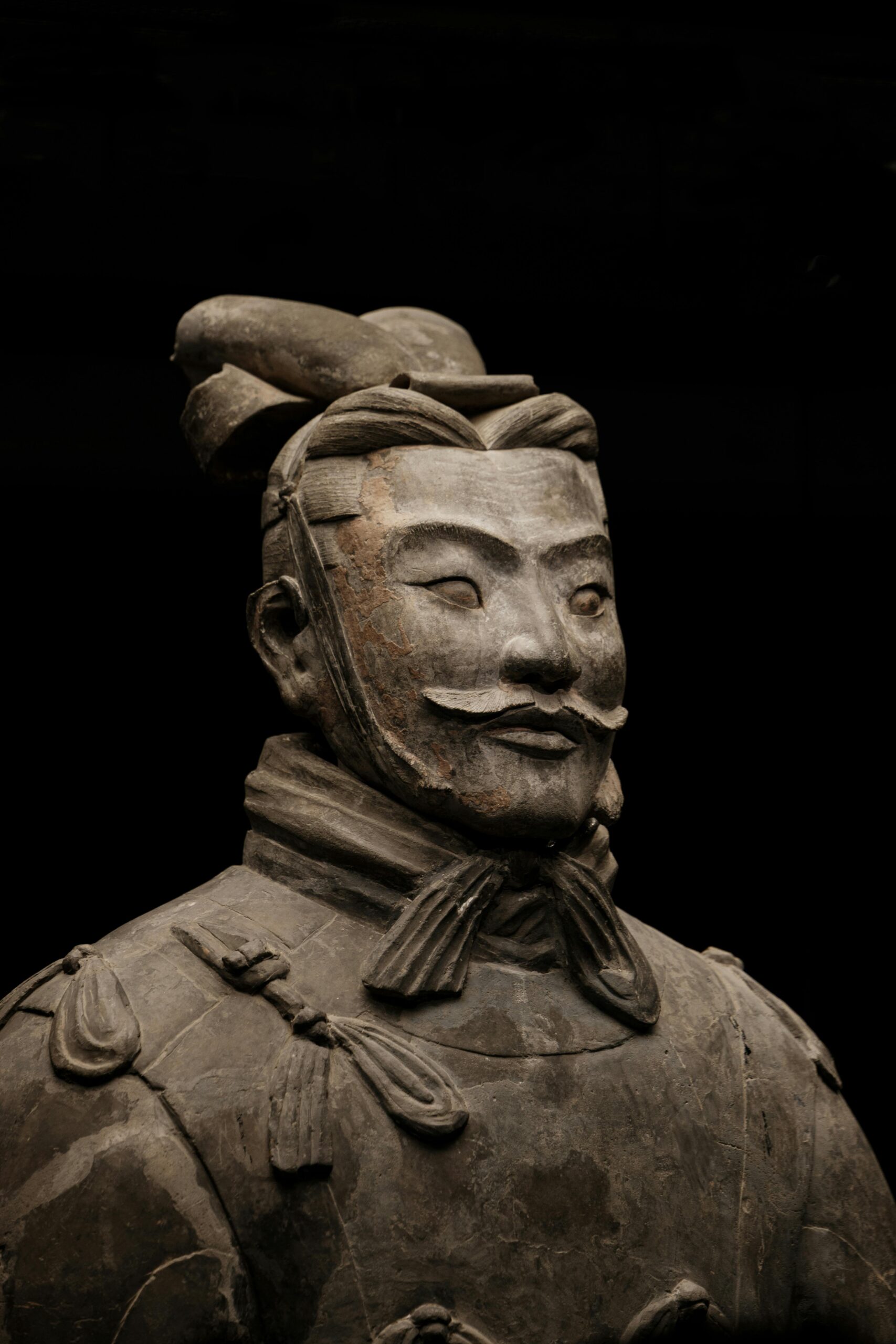 Detailed view of ancient Terracotta Warrior sculpture from China's historical army in Xi'an.